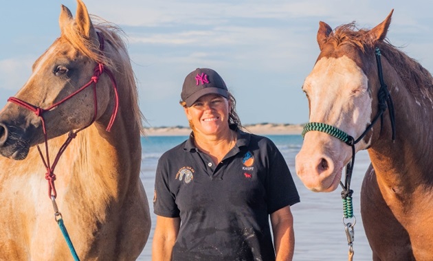 Professor Juli Coffin with a horse from the Yawardani Jan-ga program